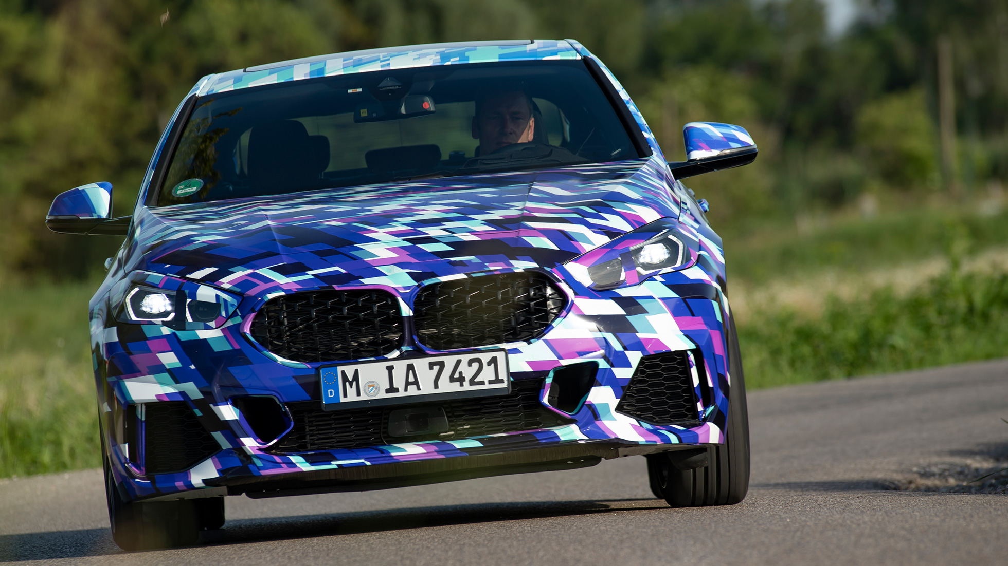 Front BMW 2 Series Gran Coupé The all-new BMW 2 Series Gran Coupé F44 with ARB technology driving sporty exterior design front view disguised prototype car