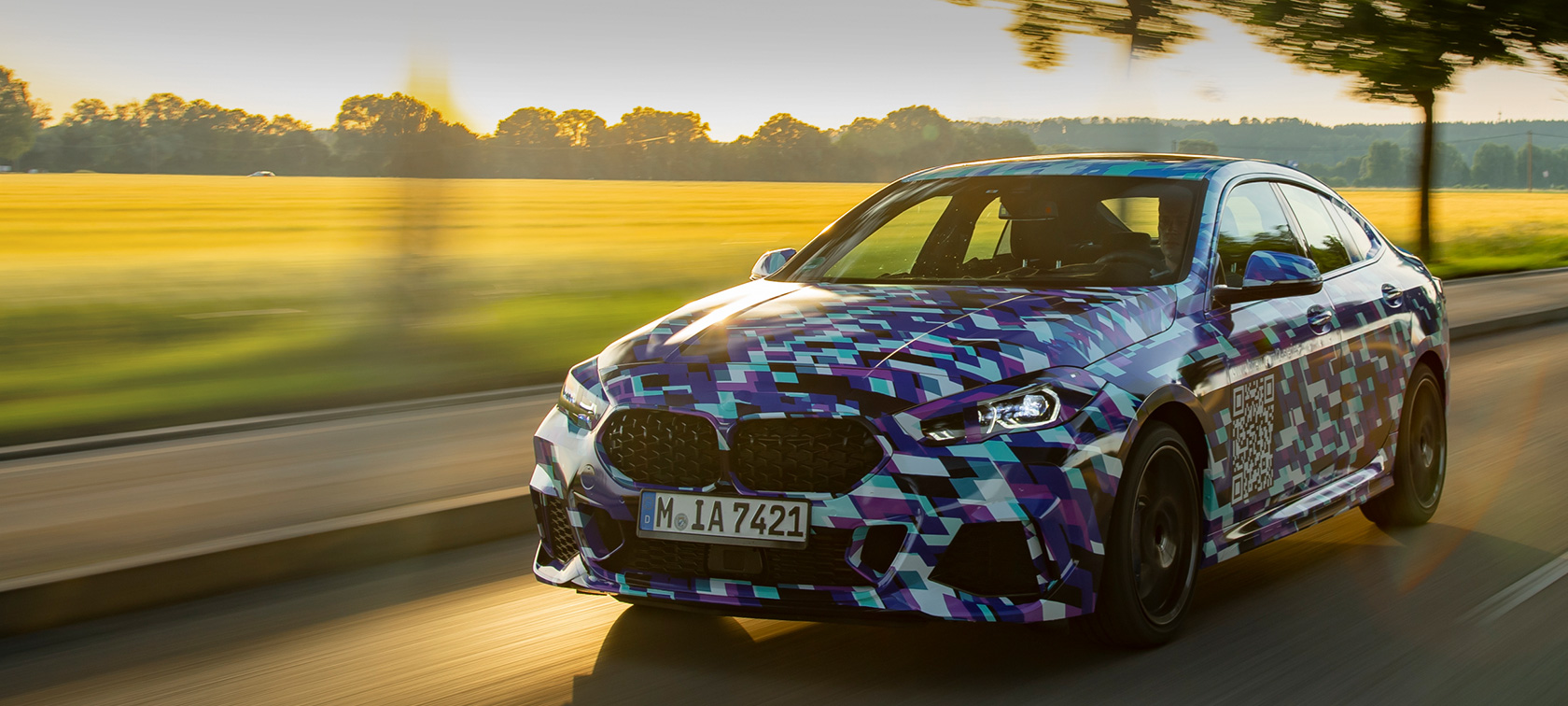 BMW 2 Series Gran Coupé F44 driving introduction first pictures exterior design three-quarter front view disguised prototype car