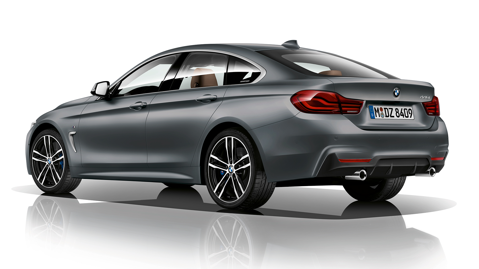 BMW 4 серии Gran Coupé, модель M Sport вид сзади с поворотом в три четверти BMW 4 серии Gran Coupé, модель M Sport вид сзади с поворотом в три четверти
