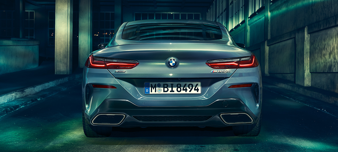 BMW 8 Series Coupé, rear view Rear view of the BMW 8 Series Coupé at night in an urban setting.