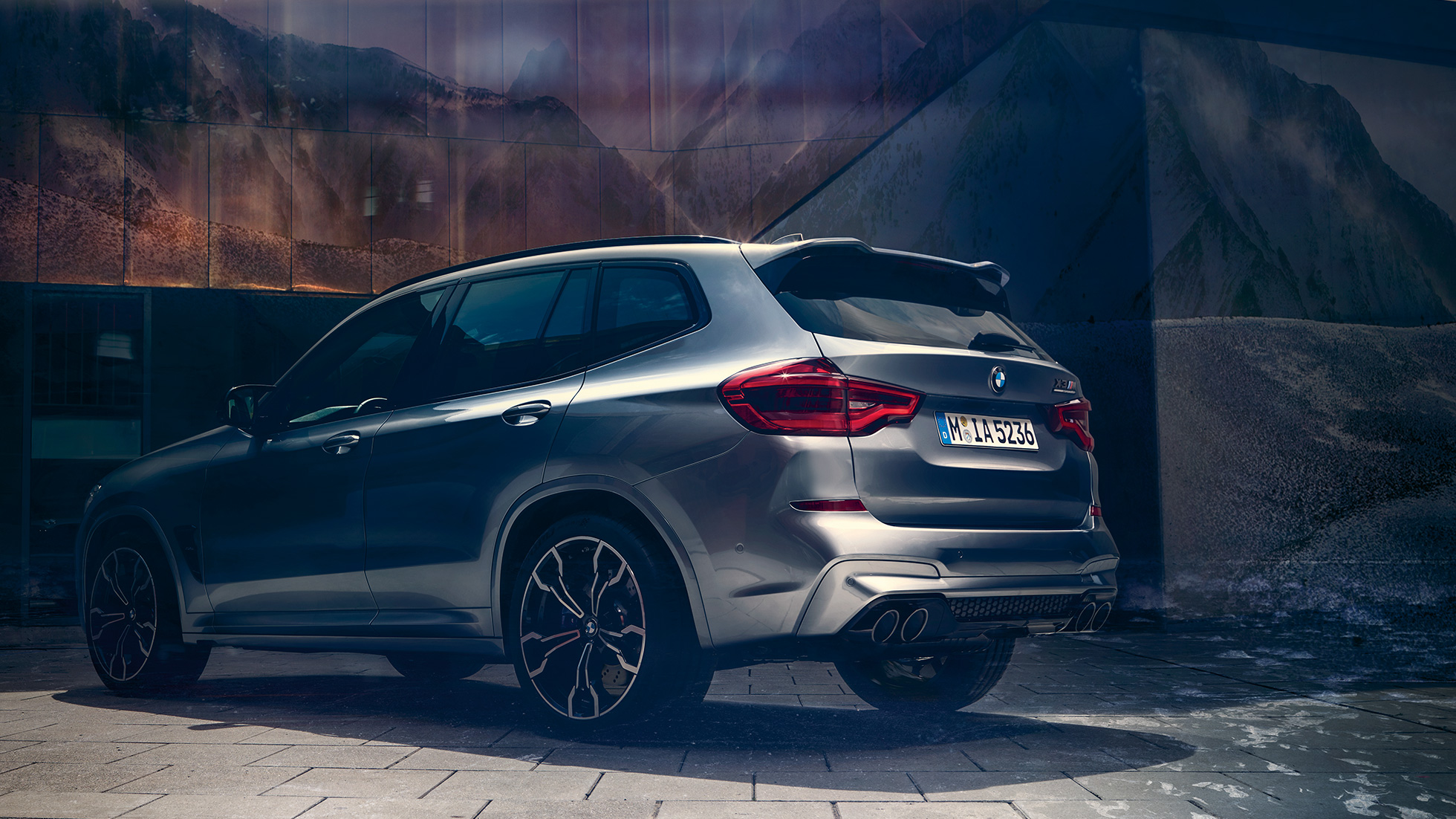 BMW X3 M Competition, lateral rear view. BMW X3 M Competition in Donington Grey metallic, exterior, lateral rear view.