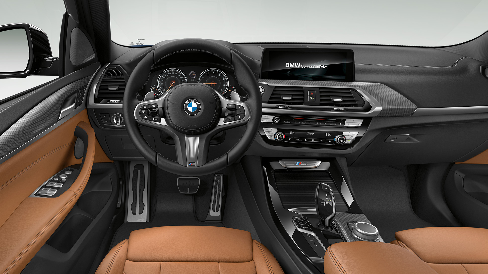 BMW X3 M40i and BMW X3 M40d, cockpit. BMW X3 M40i and BMW X3 M40d, interior, cockpit with M leather steering wheel and M Sport seats.