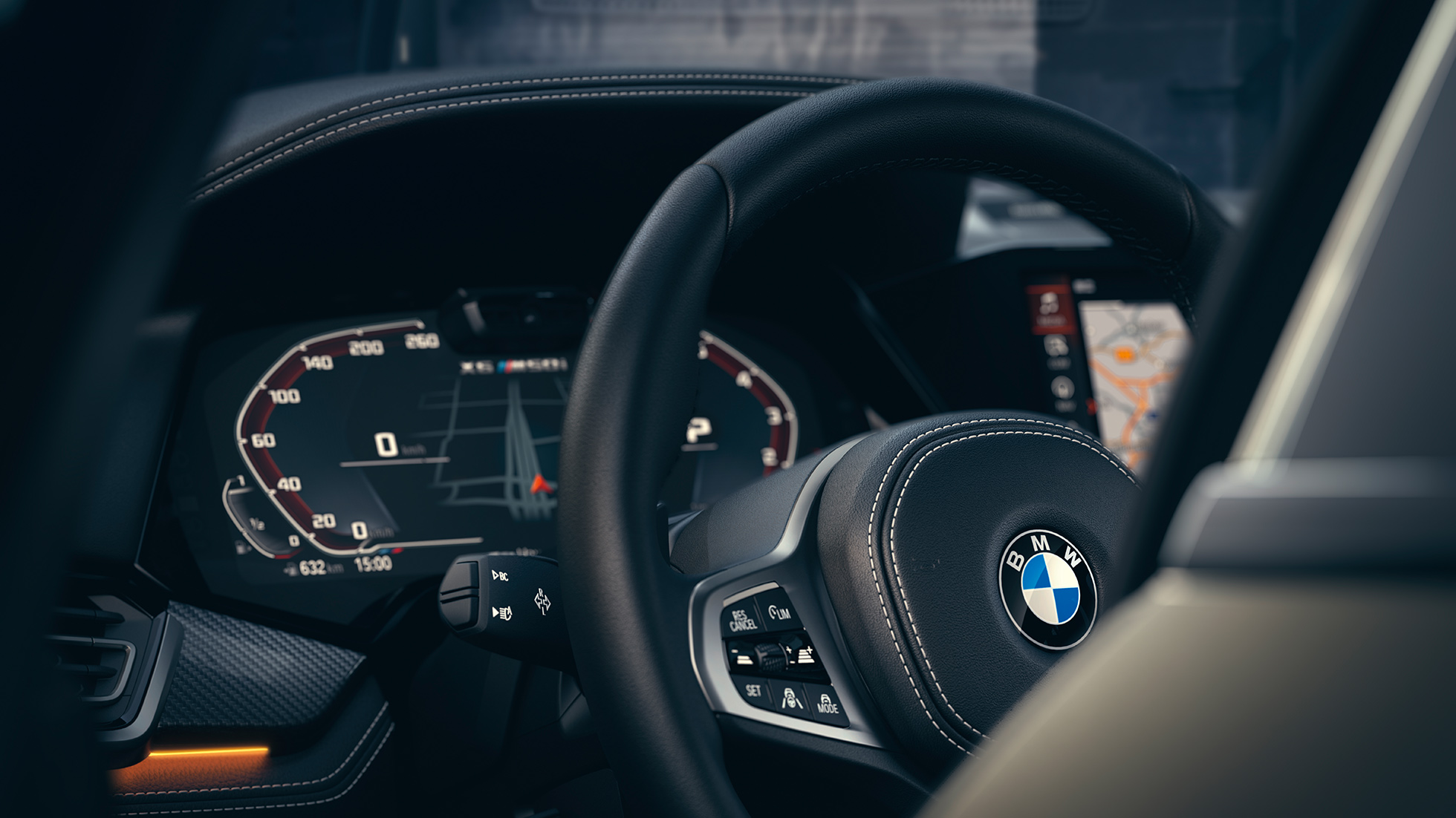 Системы помощи BMW. Крупный план салона BMW с акцентом на приборную панель.