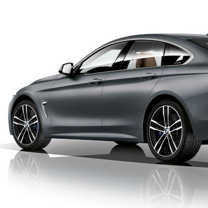 BMW 4 серии Gran Coupé, модель M Sport вид сзади с поворотом в три четверти BMW 4 серии Gran Coupé, модель M Sport вид сзади с поворотом в три четверти